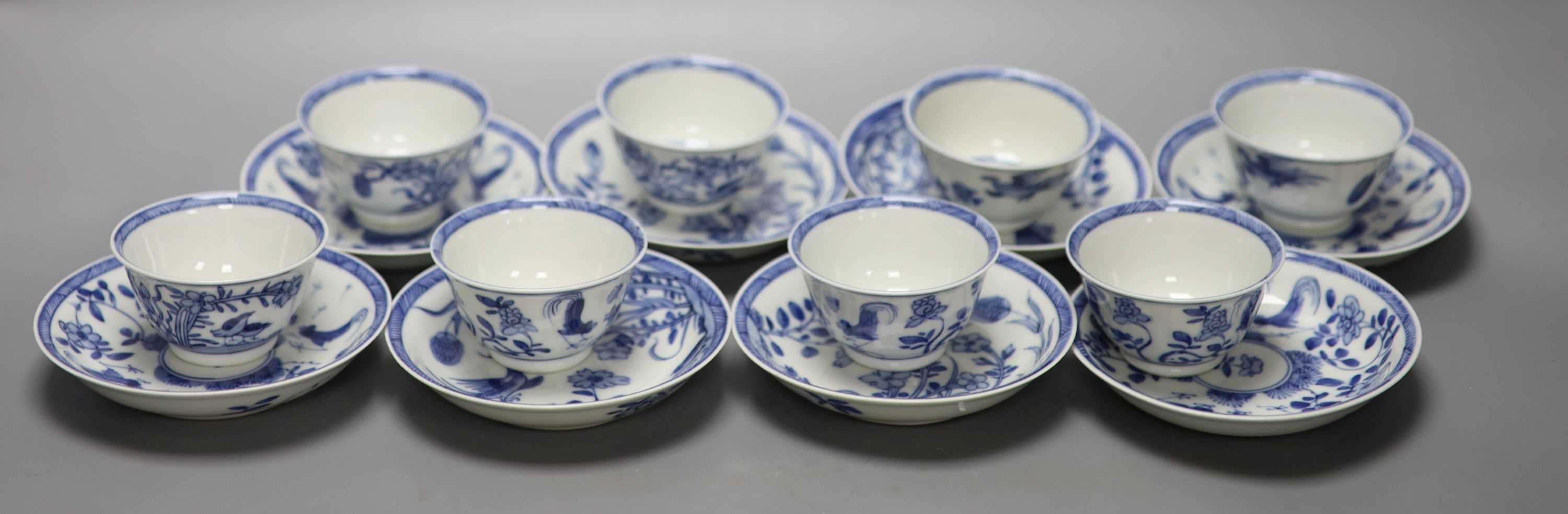 Five Chinese blue and white 'birds' tea bowls and four saucers and three 'chicken' tea bowls and four saucers (16)